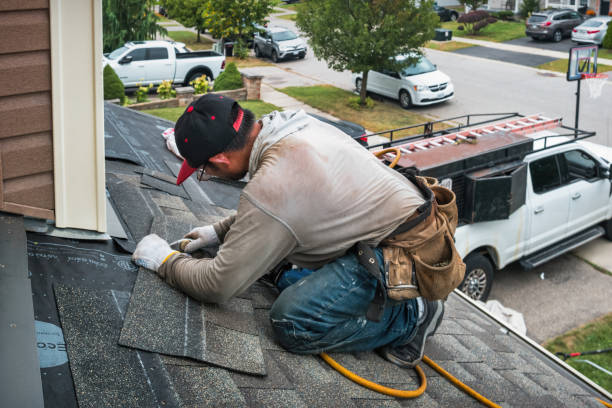 Professional Roofing technician working in Alverton, PA